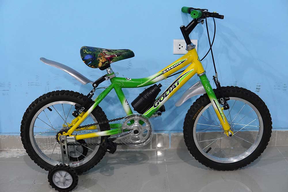 bicicleta aro 16 color verde con amarillo con auxiliares